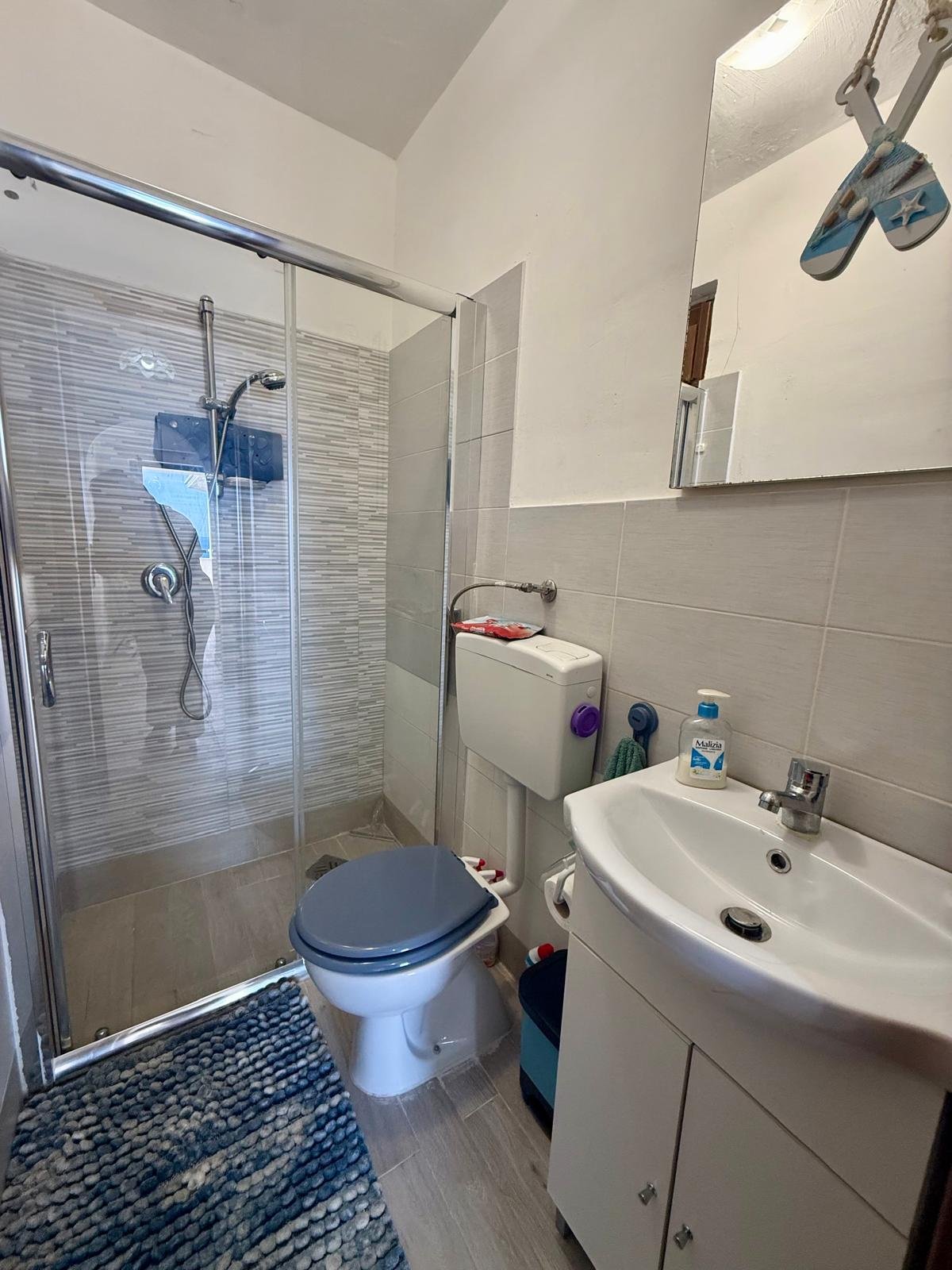 Exclusive Three-Bedroom Apartment in Scalea – Panoramic Sea View